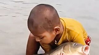 This little kid is fishing very nicely