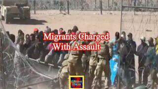 Nine migrants charged with assault, inciting a riot after storming border