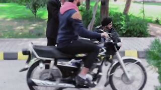 Mobile snatching prank.