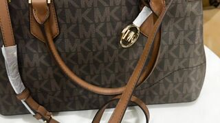 Michael kors branded hand bag for sale/price 35k