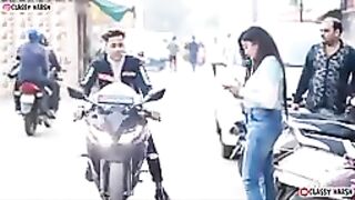 Giving Red Rose To Strangers On Bike