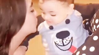 Be sure to tell what the little child is doing in the comments