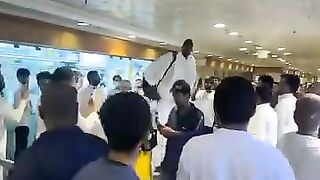 Tall men perform Umrah