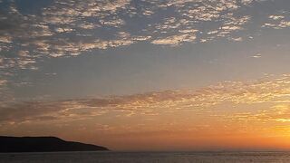"Summer Serenity: Captivating Sunset on the Beach"
