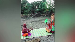 Village women play pillow