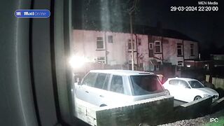 Moment brave mother chases after masked 'carjacker'