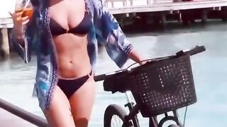 Amanda Holden flaunts jaw-dropping figure in tiny black bikini