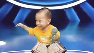 A child will read the Quran in front of everyone