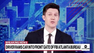 Driver rams car into gate of FBI Atlanta bureau.