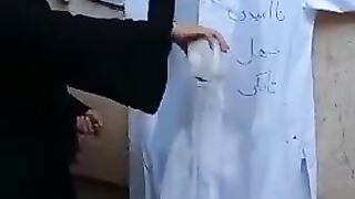 Women's burn Taliban clothes