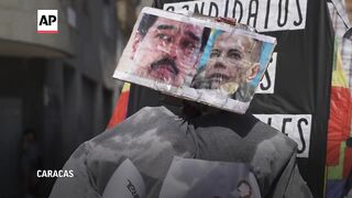 Effigies of political leaders set on fire as part of Judas burning tradition in Venezuela.