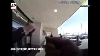 Police on horses chase a shoplifter in New Mexico.
