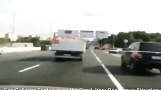Gas cylinder exploded on the road.