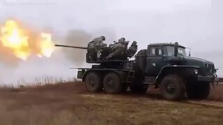 Ukrainian artillery fires anti-aircraft gun mounted on heavy truck at targets