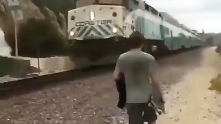 Kids skateboard on a ongoing train