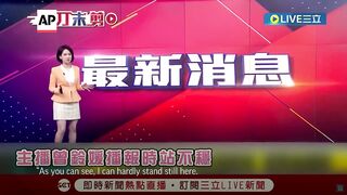 Taiwan TV studio shakes during earthquake report.