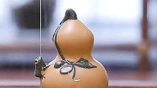 Purple clay gourd spray water tea pet .