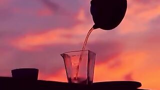 ”What a beautiful sunset! How pleasant it is to have a cup of tea.“