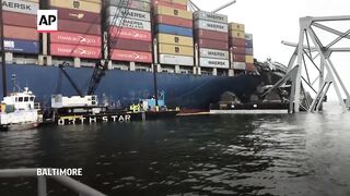 New video shows collapsed bridge, damaged ship in Baltimore.