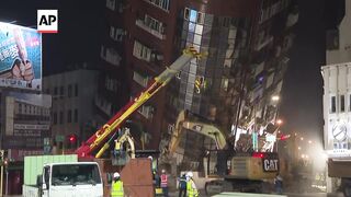 Taiwan carries out operation at partially collapsed building after earthquake.