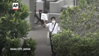 People in Japan's Okinawa seek safe shelter after Taiwan earthquake.