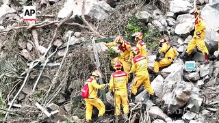 Taiwan rescuers retrieve body from hiking trail after quake.