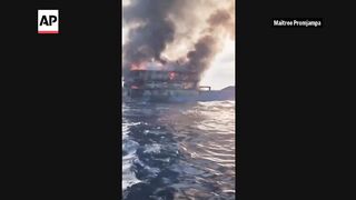 Dramatic video shows fire sweeping through ferry in Thailand.