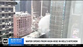 Water spews from high-rise in Hell's Kitchen.