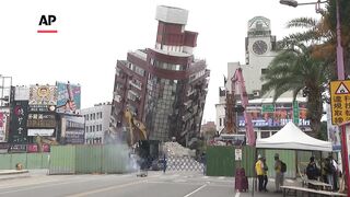 Demolition of a building tilted by Taiwan's earthquake starts in Hualien.