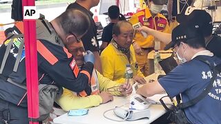 Rescuers in Taiwan search for missing and stranded after quake kills 10.