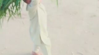Little boy taking grass
