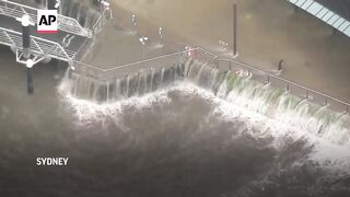 Heavy rain lashes parts of Australia's southeast triggering flood warnings.