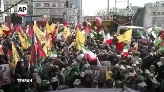 Iranians mourn  Revolutionary Guards Corps members killed in Syria attack.