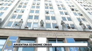 Argentina economic crisis_ Public employees protest over job cuts.