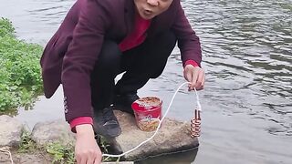 Madman using water heater in river