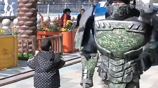 Robot chasing bear