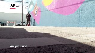 Artist paints mural in Texas ahead of solar eclipse.