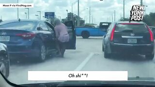 0:45 / 0:47   Road rage turns into brutal beatdown at a traffic light