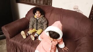 Babes are playing in a house