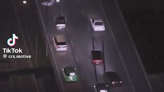 Drifting snake between traffic