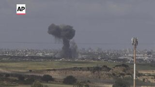 Explosion sends smoke rising over Gaza as war reaches six-month mark.