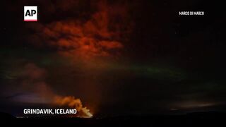 Lava and northern lights_ Eruptions slowing from volcano in Iceland.
