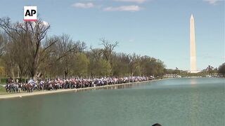 Rallies held in Washington and New York to mark six months of Israel-Hamas war.