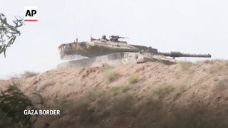 Israeli troops seen near Gaza border as Netanyahu renews pledge to attack Rafah.