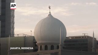 Indonesian Muslims hold Eid al-Fitr prayers to mark the end of Ramadan.