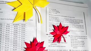 Hand-folded maple leaf bookmarks