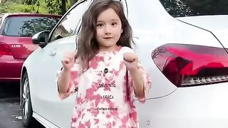 Funny baby girl dancing with car touch sound