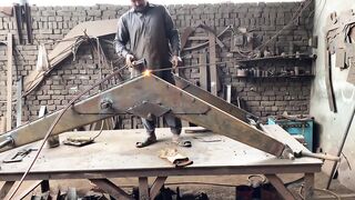Manufacturing Process of Tractor Front Loader .