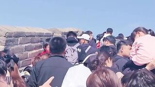 Look at the crowd of people on the Great Wall of China