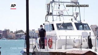 Three found dead, 16 rescued after a boat carrying migrants hits rocks near Greek island.